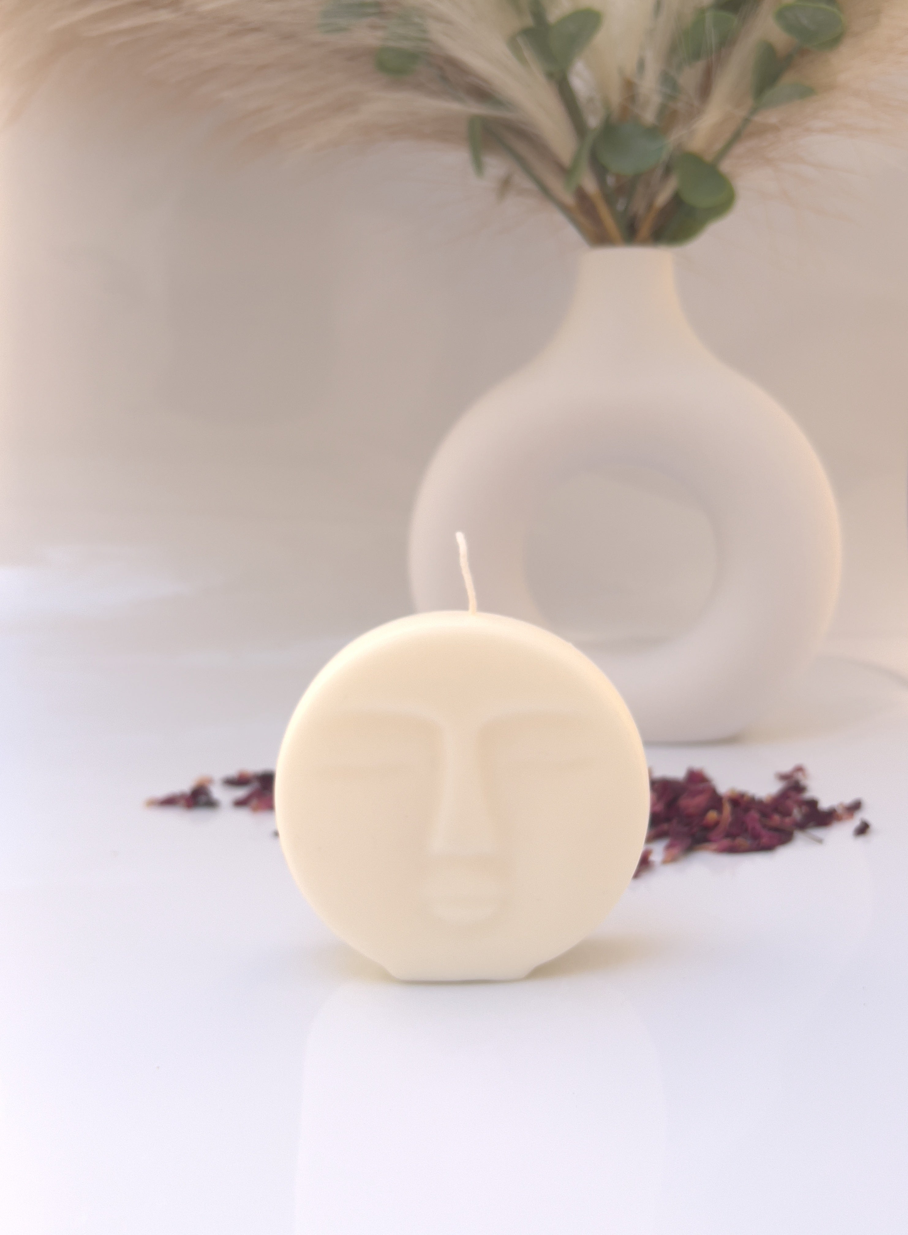 Vela decorativa cara