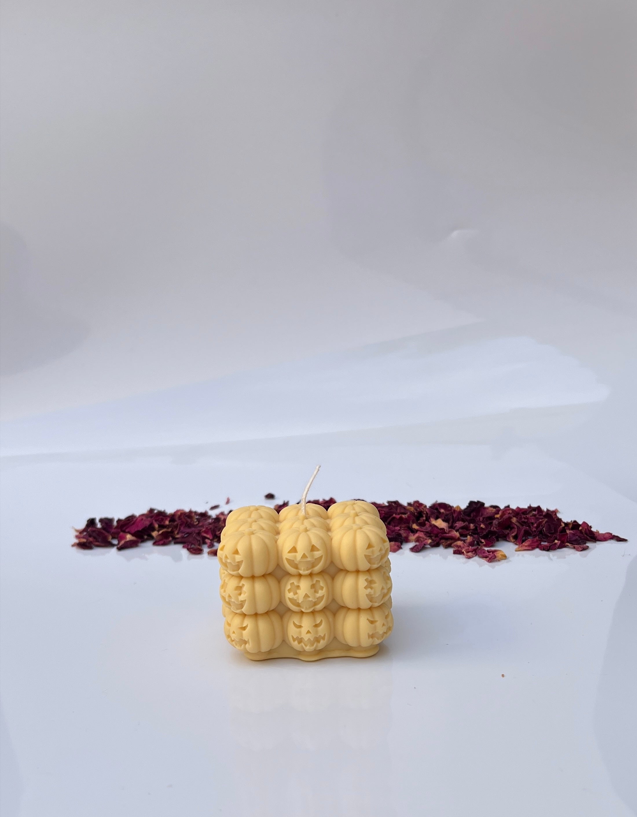 Vela cubo de calabazas